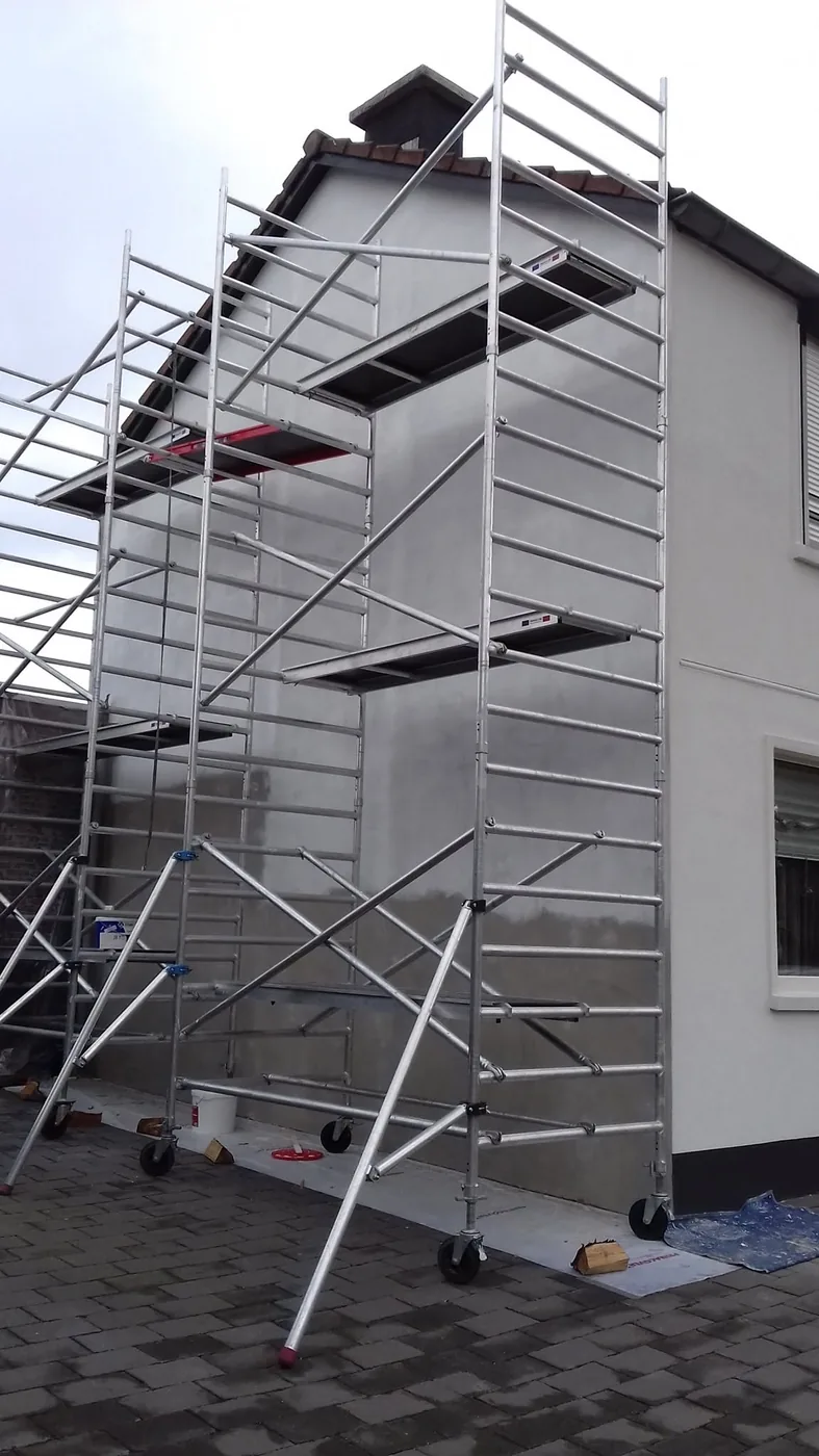 Schilderwerk aan de buitenzijde van een woning